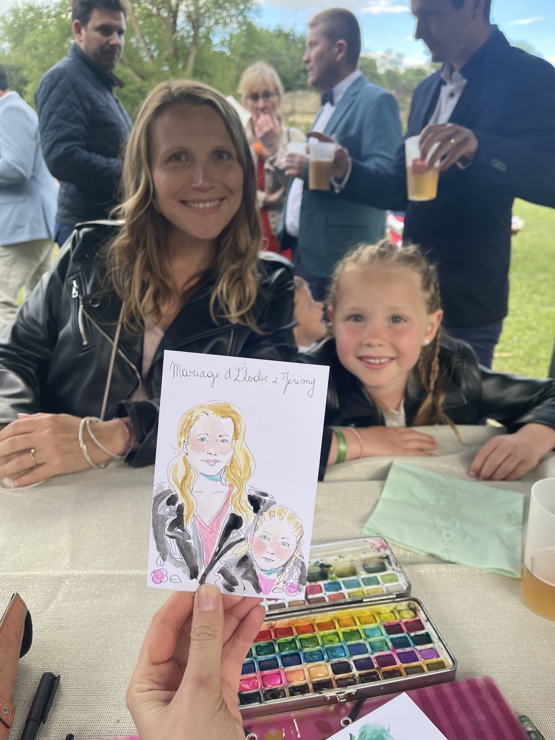 Portrait d'une femme et d'une enfant réalisé à l'aquarelle dans le cadre d'un mariage.